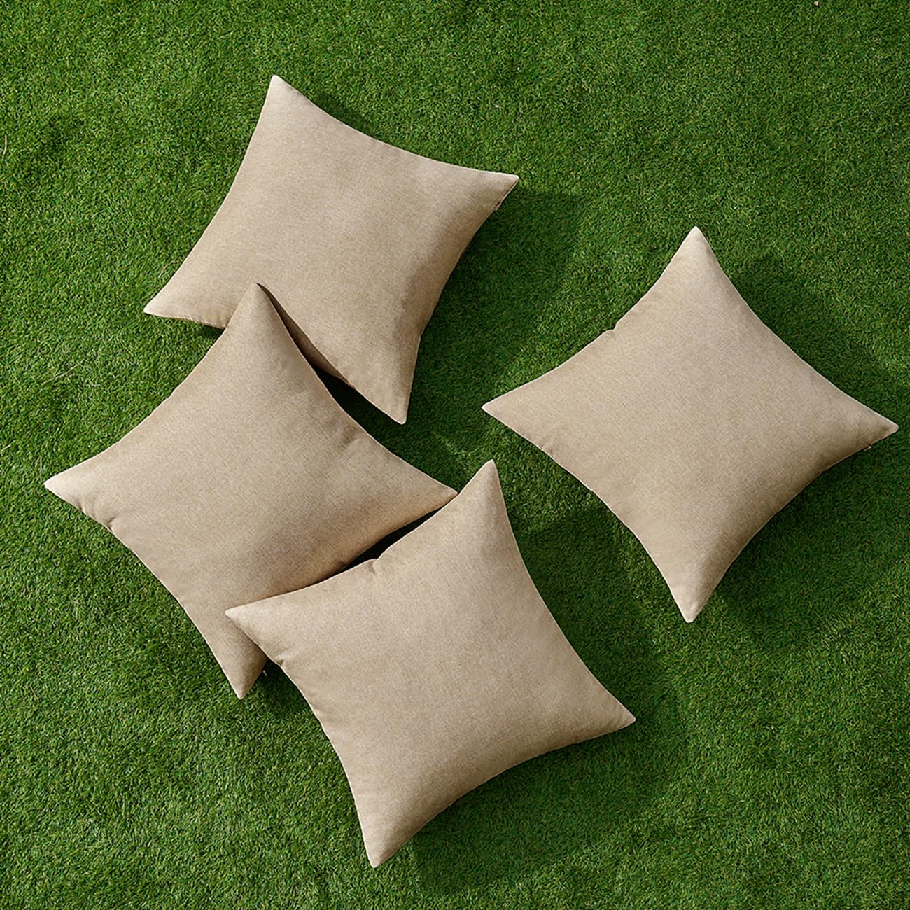 MIULEE outdoor pillow cover light tan 18x18 shown in garden setup