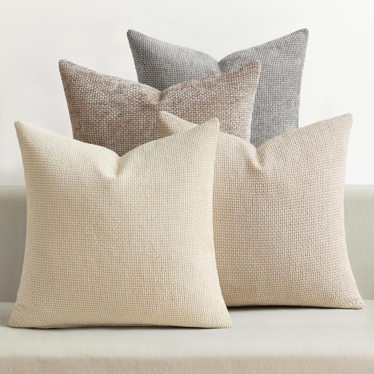 MIULEE pillow cover 18x18 neutral beige-brown sits on a sofa for versatile decor.