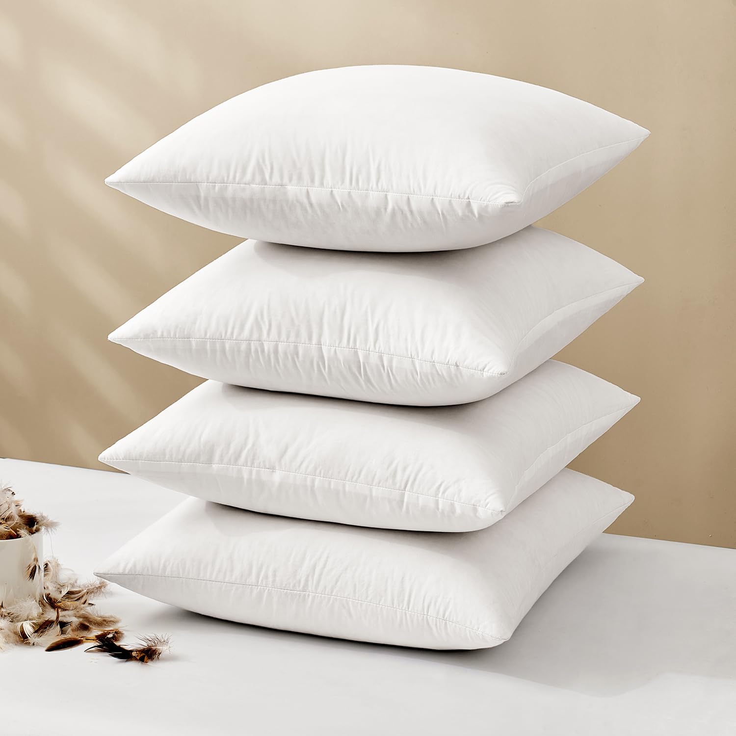 MIULEE 18x18 white pillow inserts shown in front view for sofa styling.