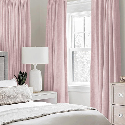 MIULEE pink blackout curtains provide thermal insulation and privacy for daytime use.