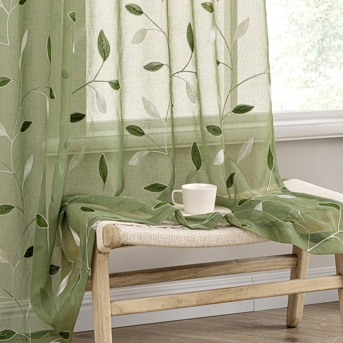 MIULEE sage green sheer curtains with embroidered leaves, ideal for bright living spaces.
