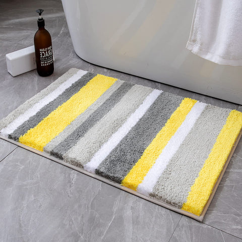 MIULEE yellow grey striped bath rug on a clean floor, offering soft warmth and style.