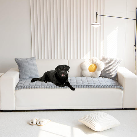 Mivnue Pet Couch Cover non-slip backing keeps the cover in place on any sofa.