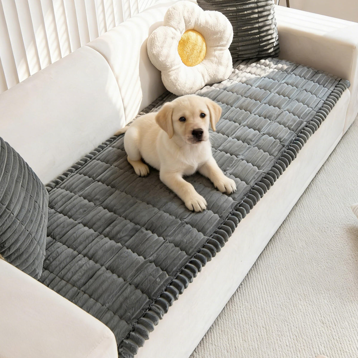 Mivnue pet couch cover with non-slip backing keeps the sofa in place during play