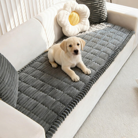 Mivnue pet couch cover with non-slip backing keeps the sofa in place during play