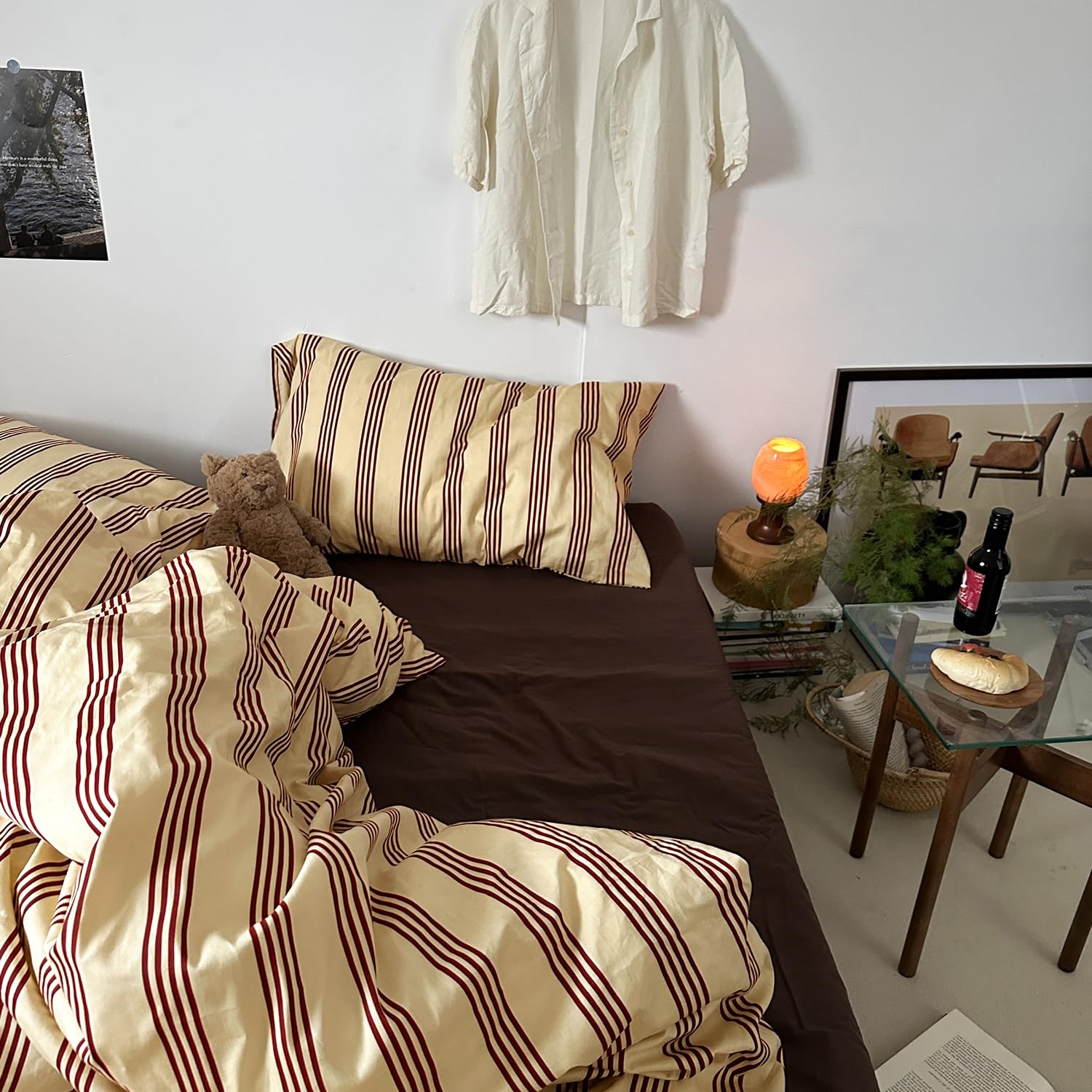 Stylish Mixinni bedroom setup featuring retro-striped bedding.