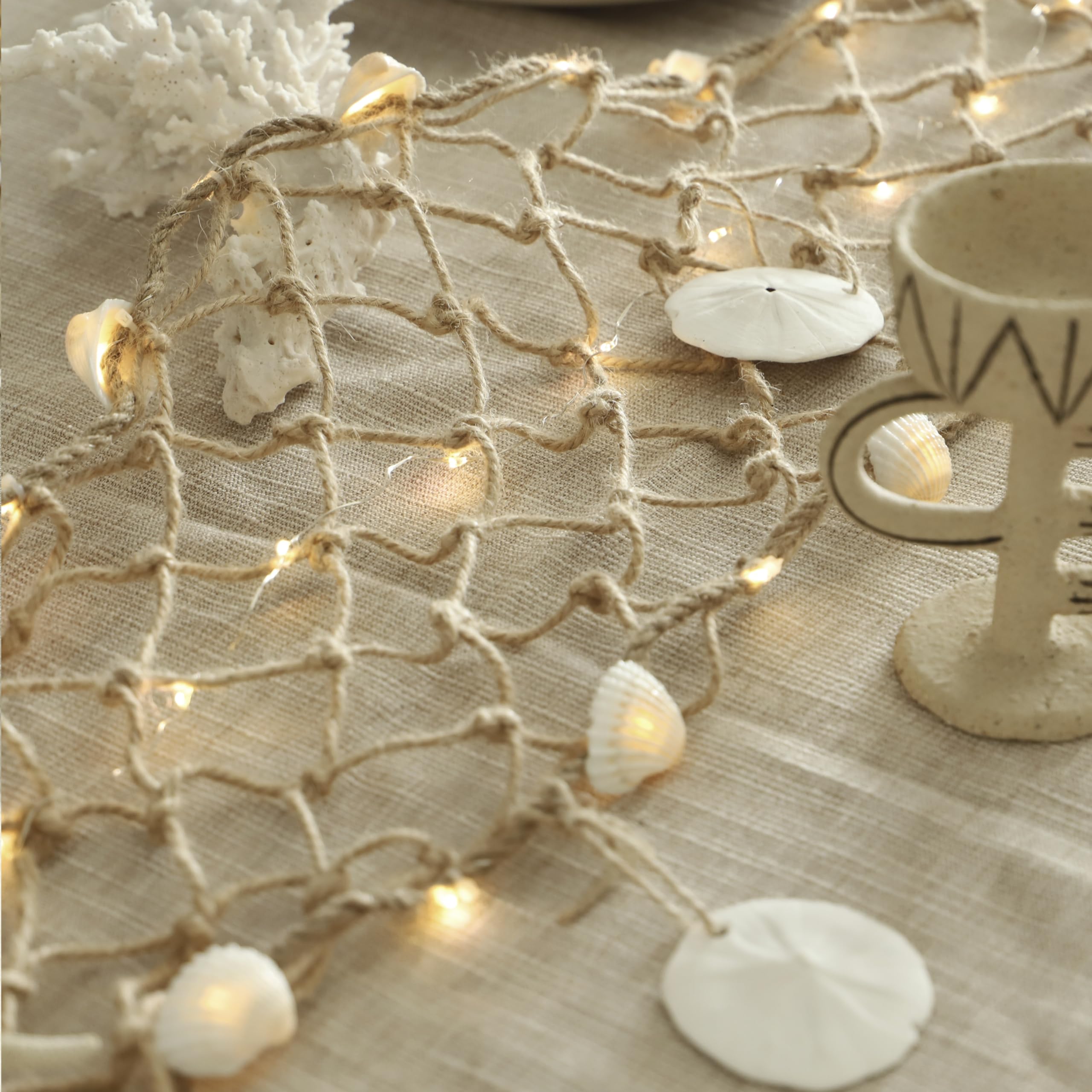 MIYA LIFE sand dollars and shells add seaside texture to any wall.