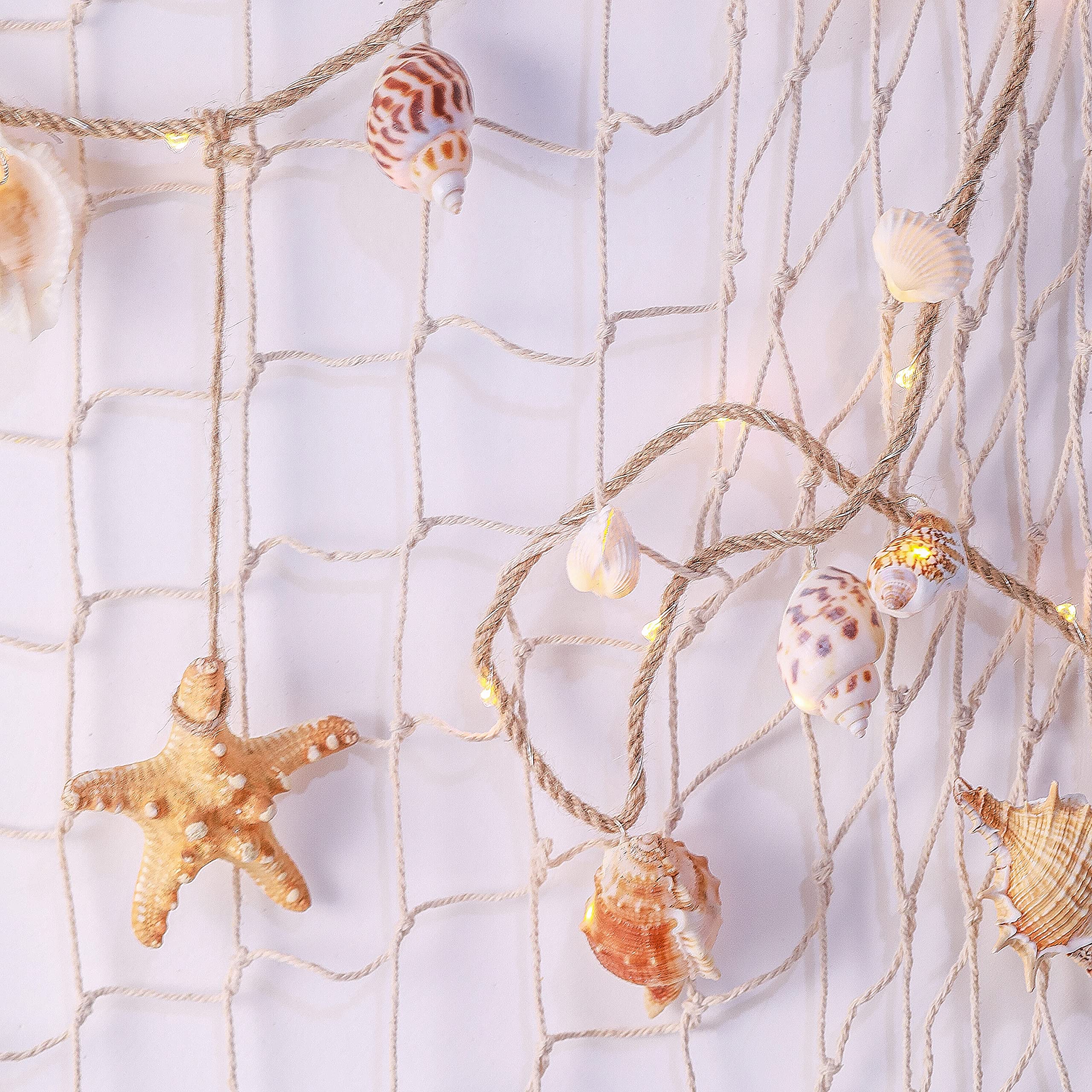 MIYA LIFE nautical garland with shells creates a whimsical seaside vignette.