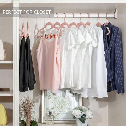 MIZGI slim-profile hangers keeping shirts and skirts neatly aligned.
