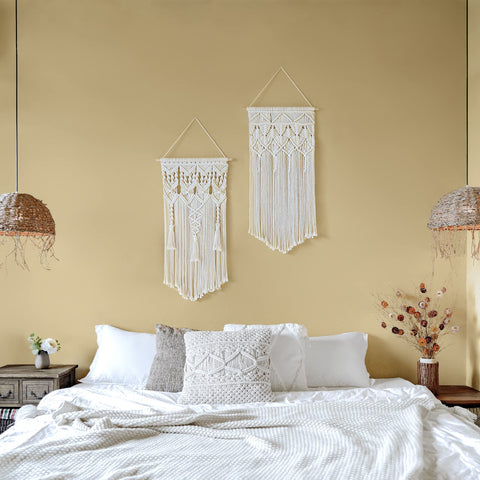 Mkono macrame wall hanging tassel detail brings warm texture to bedrooms or nurseries.