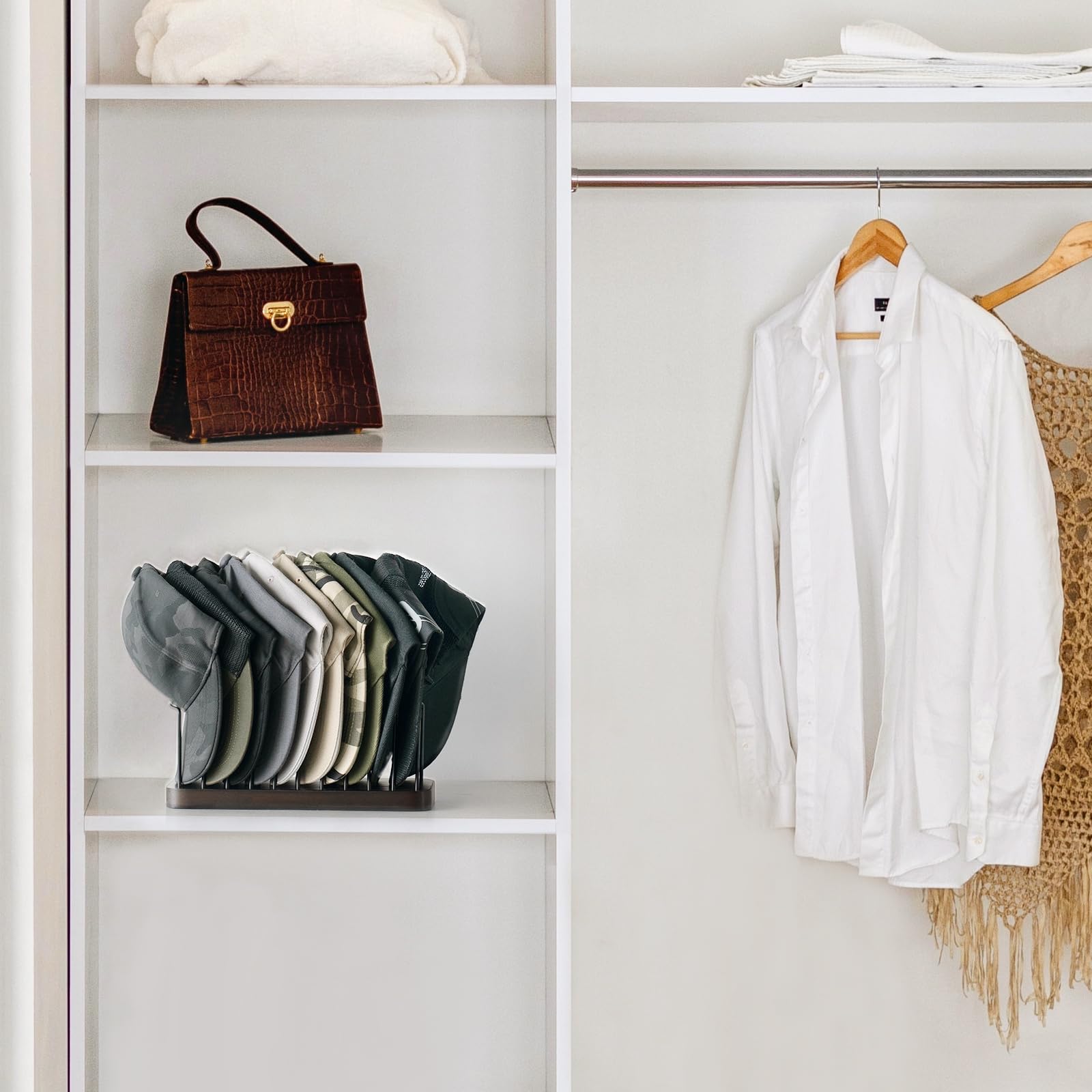 Mkono curved iron-frame preserves cap shape while organizing
