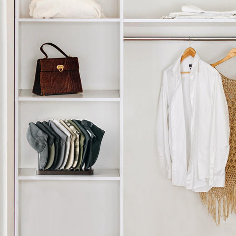 Mkono curved iron-frame preserves cap shape while organizing