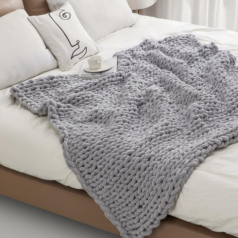 MocaDng hand-knitted chenille throw close-up in gray, soft touch