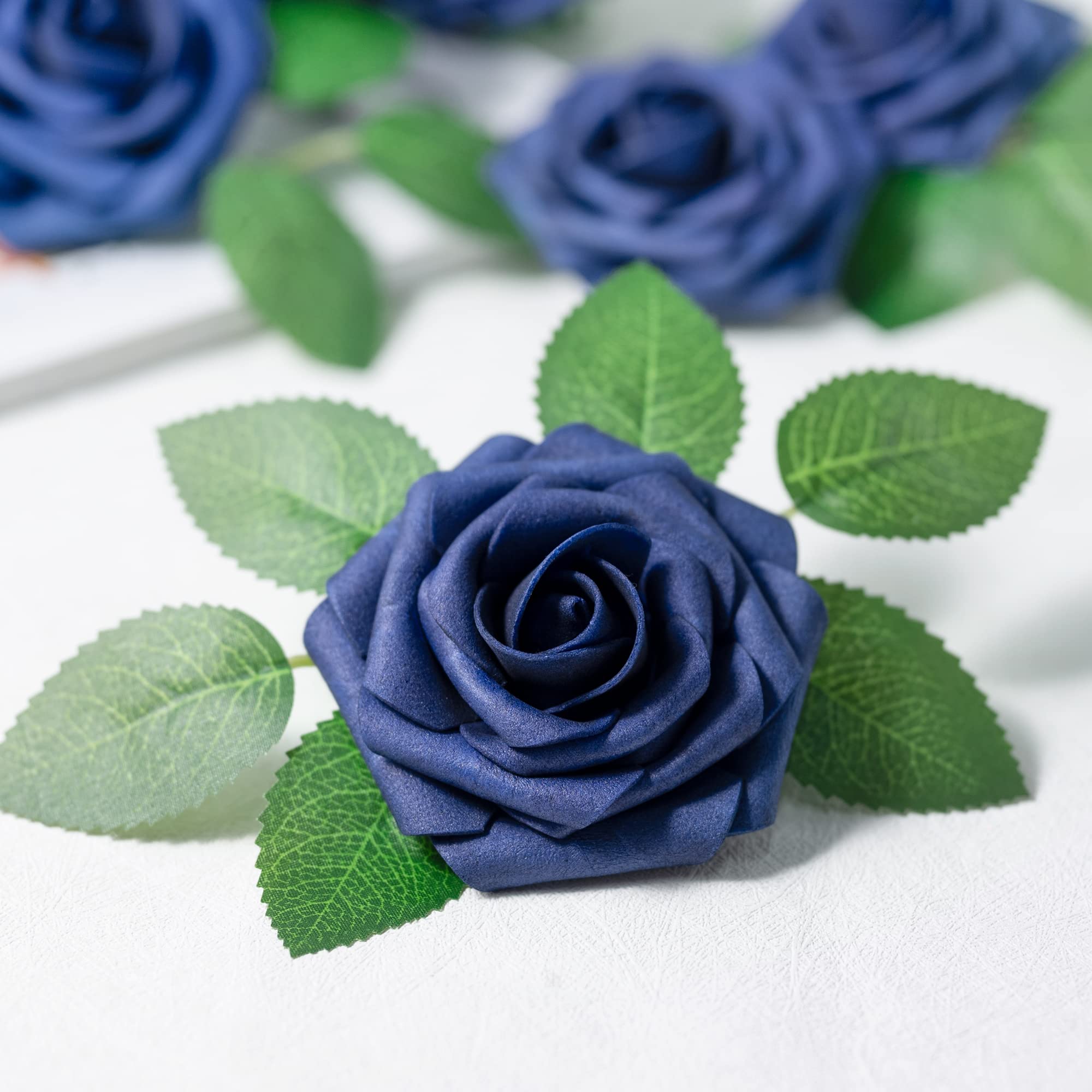 Mocoosy blue rose with stem showcases 8-inch length for easy crafting and arrangement.