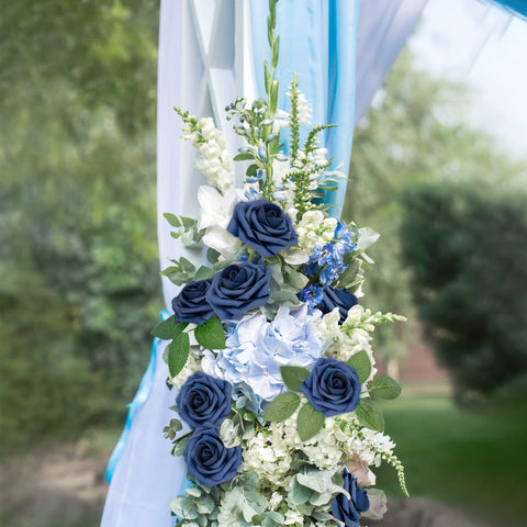Mocoosy table centerpiece featuring navy-blue foam roses and lush accents.