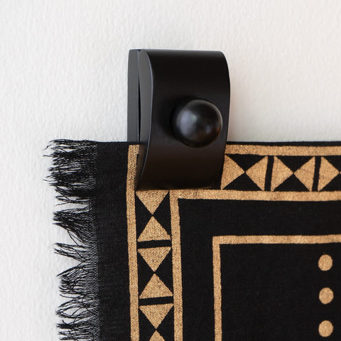MOCTUS blanket or tapestry display idea using wall clips
