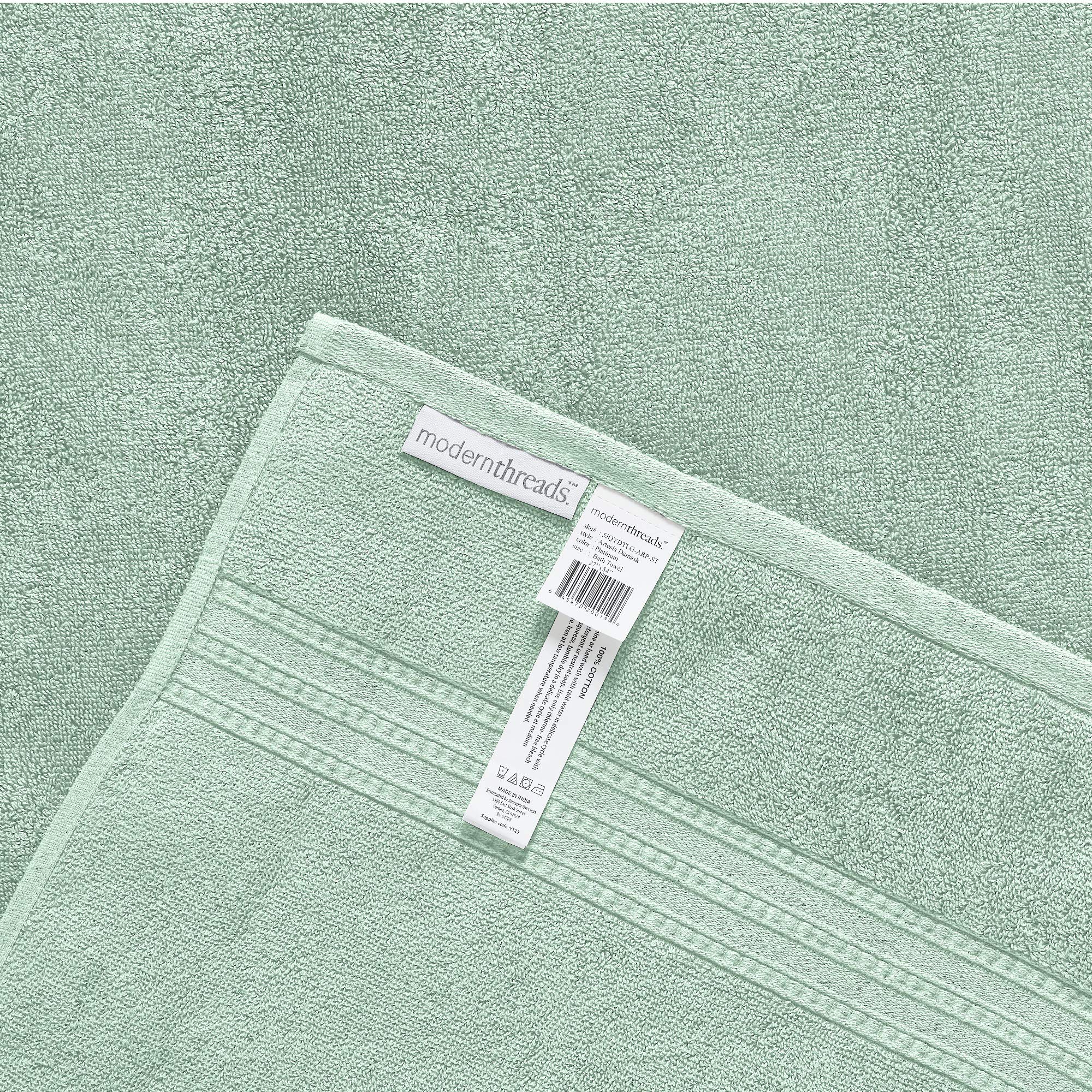 Modern Threads Artesia Damask Sage towel set displayed in bathroom decor.