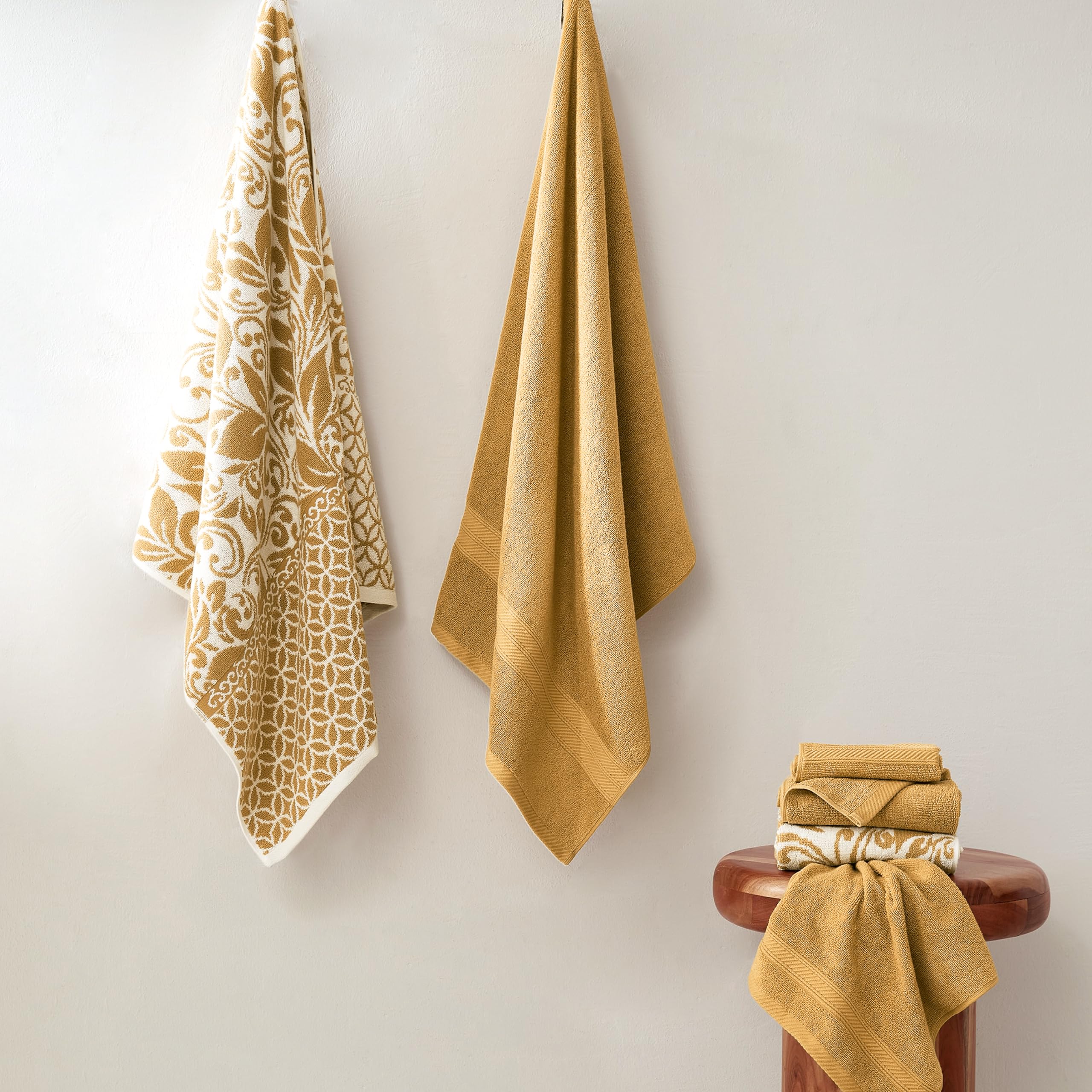 Modern Threads Botanical Vine Gold bath towels show generous 27x54 inch size for full-body coverage