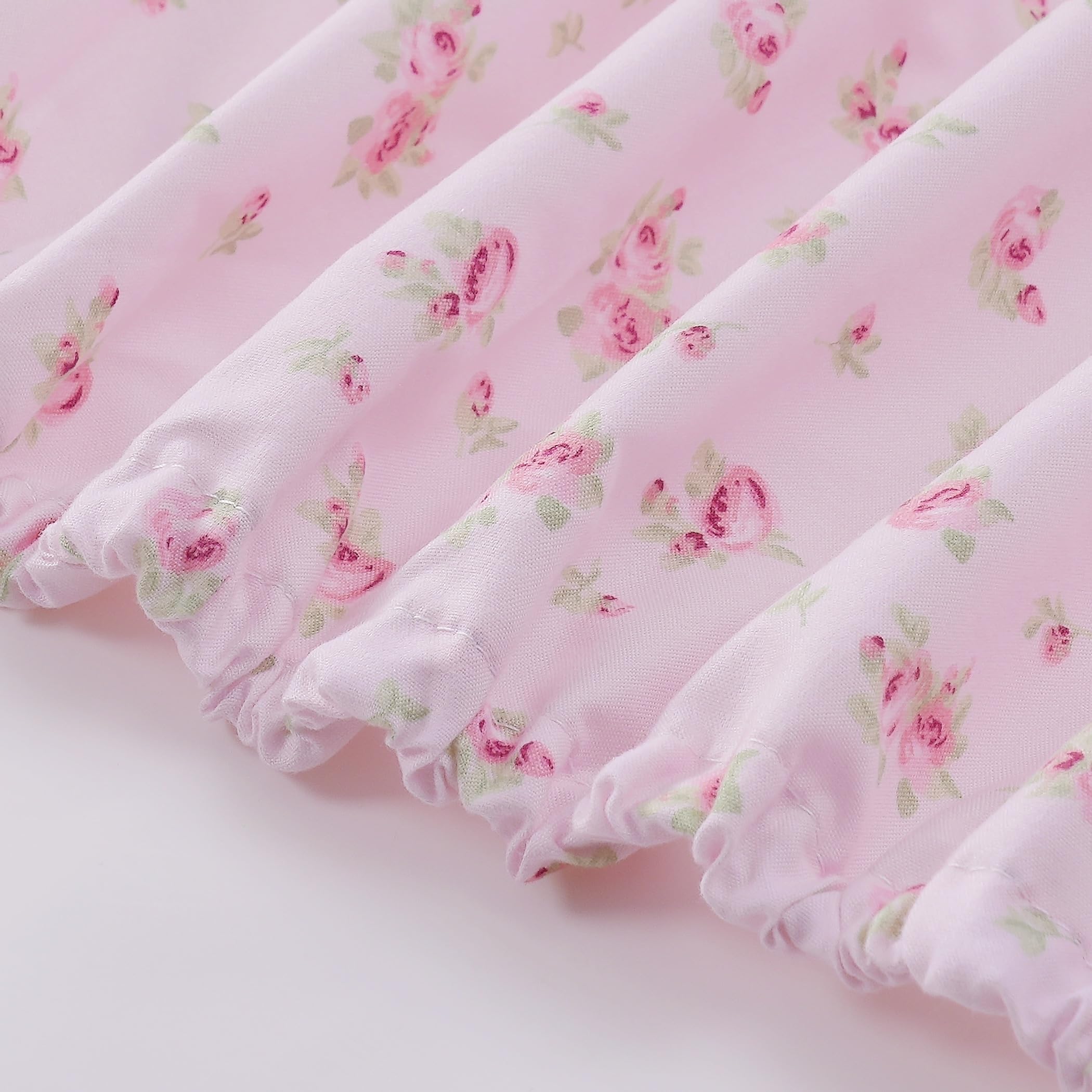 Modern Threads Roses on Blush deep-pocket-fit secures sheets for a non-slip sleep surface.