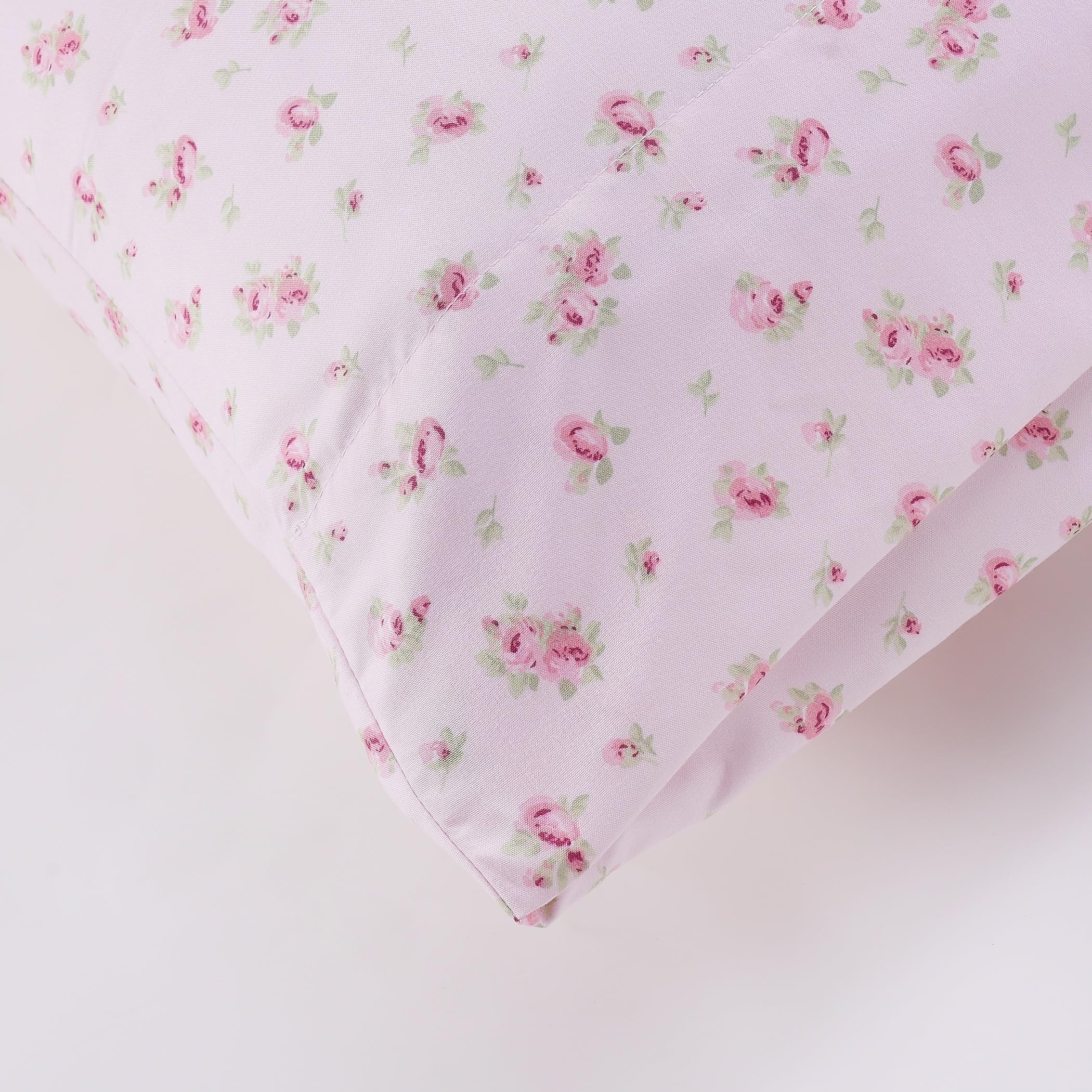 Roses on blush pattern adds romantic touch to bedroom décor.