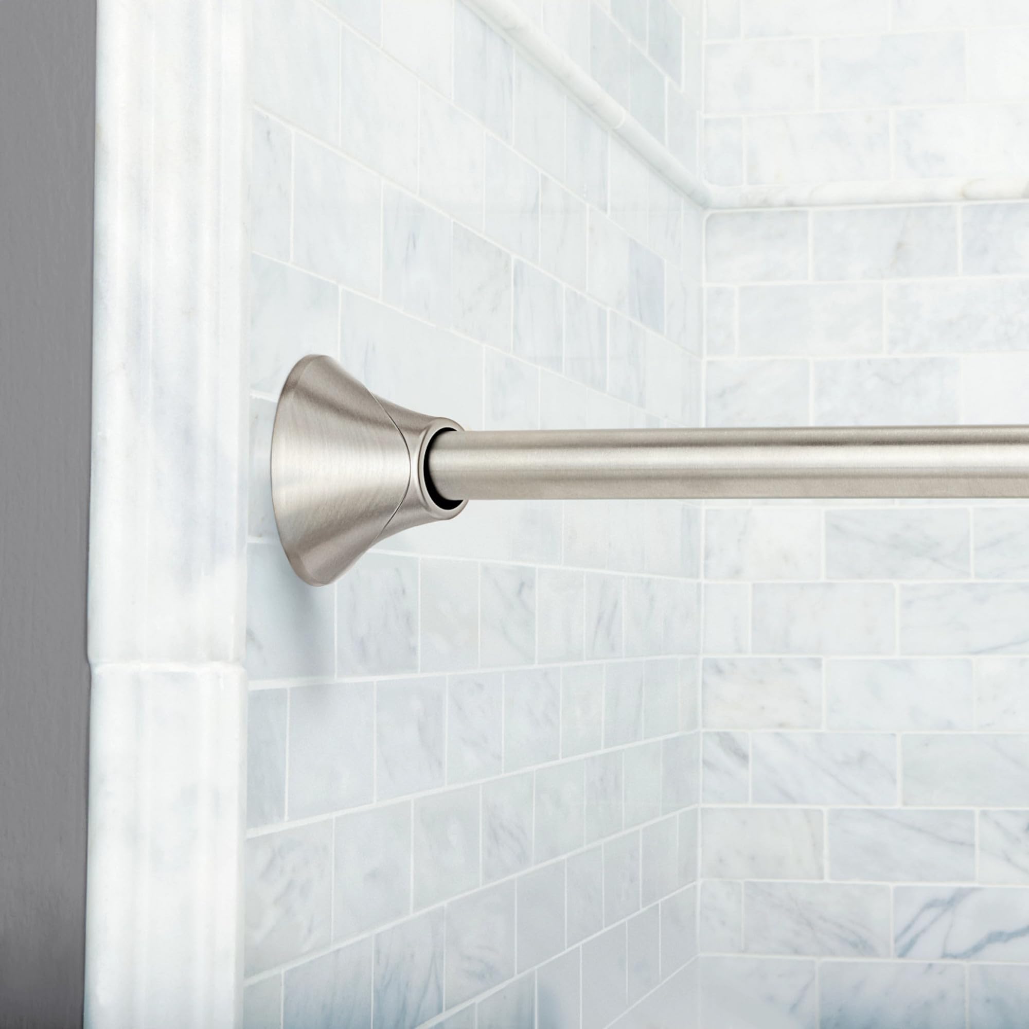 Moen curved rod adjusts to fit 5 to 6 foot showers.