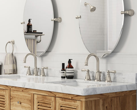 Close-up bevel on Moen Glenshire mirror highlights refined edge and finish.