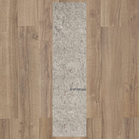Mohawk Home rug pad safeguards carpet and reduces wrinkles.