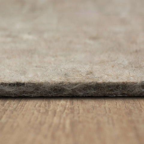 Easy trimming with scissors for perfect rug fit.