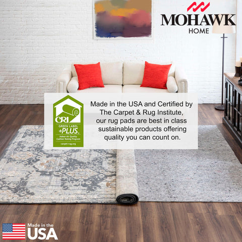 Mohawk Home rug pad being trimmed with scissors for a precise fit
