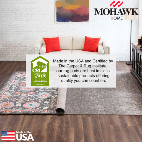 Mohawk Home rug pad stays under carpet securely.