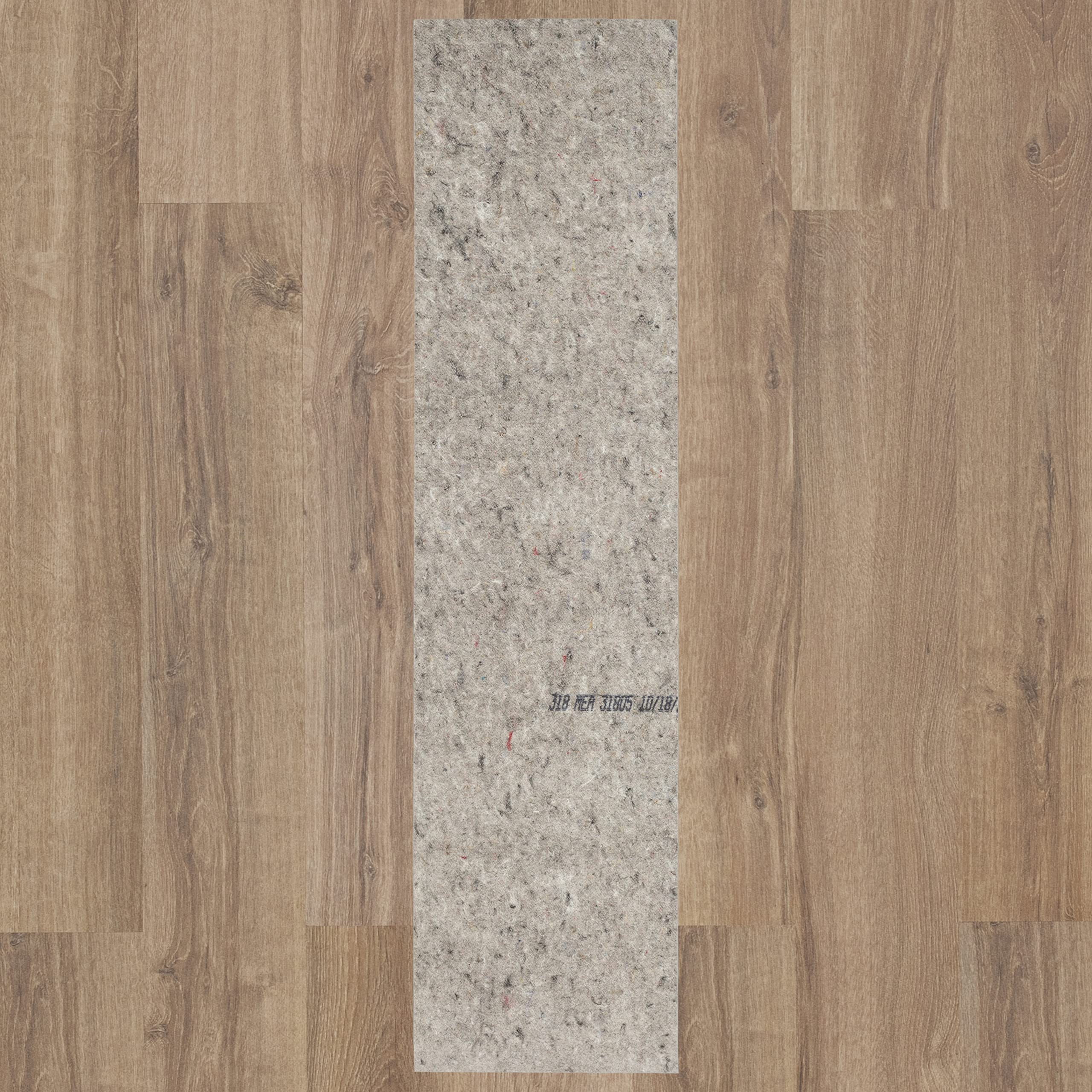 Mohawk Home rug pad on tile protecting floors from scratches.