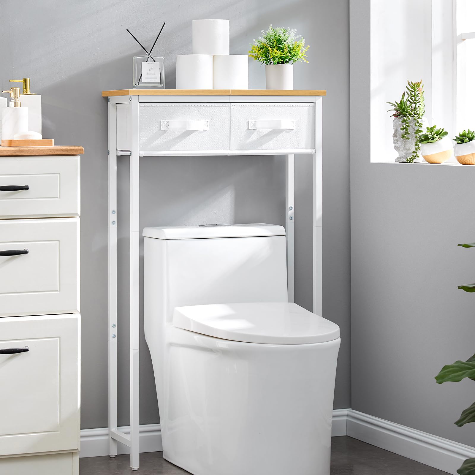 MOHOPE over-the-toilet shelf with fabric drawers highlighting hidden storage for towels and toiletries