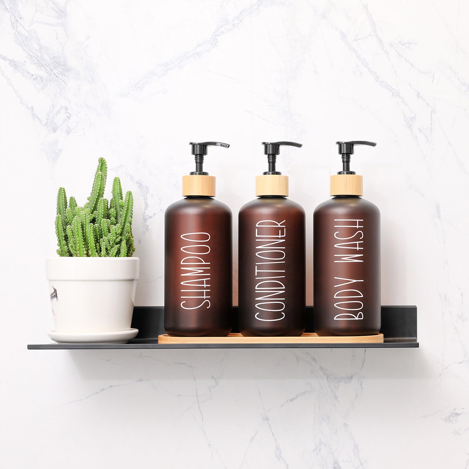 MOMEEMO Amber bottle set featuring bamboo pumps for smooth, drip-free dispensing.