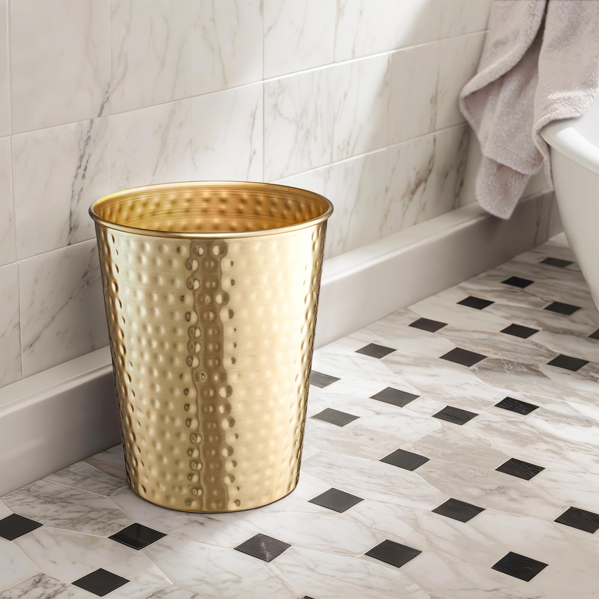 Monarch Abode bathroom trash can doubles as storage or planter feature.
