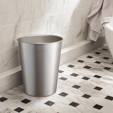 Monarch Abode metal wastebasket bathroom ambience under humid conditions highlights durability.