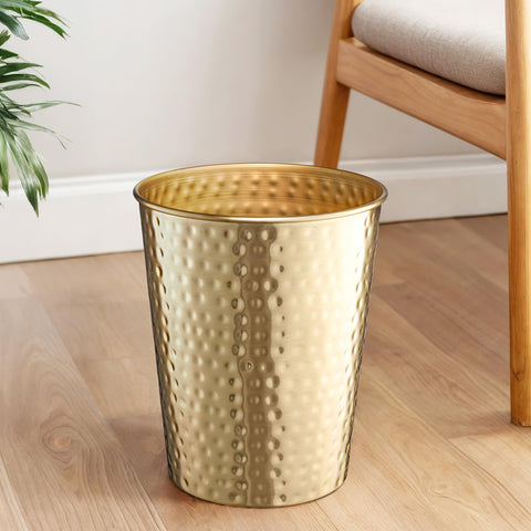 Monarch Abode rust-resistant metal trash bin combines durability with decorative appeal.