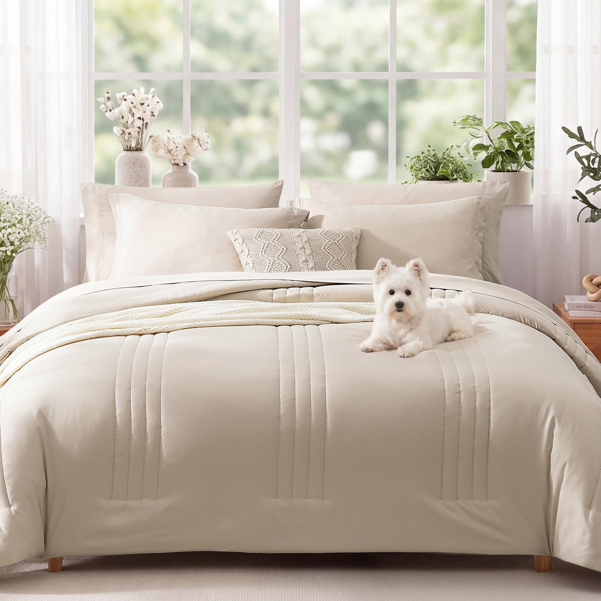 Beige sheets and pillowcases from Monbix complement the comforter set.