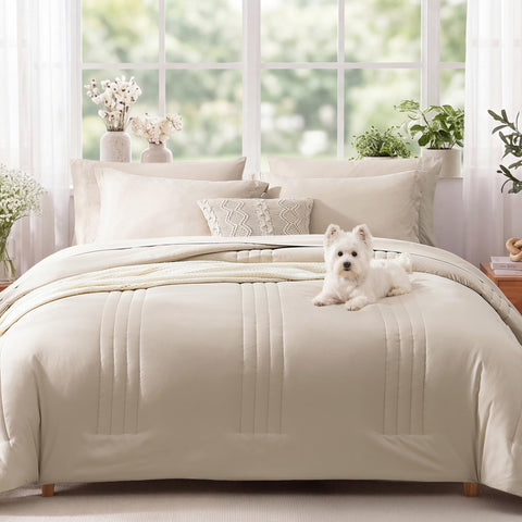 Beige sheets and pillowcases from Monbix complement the comforter set.