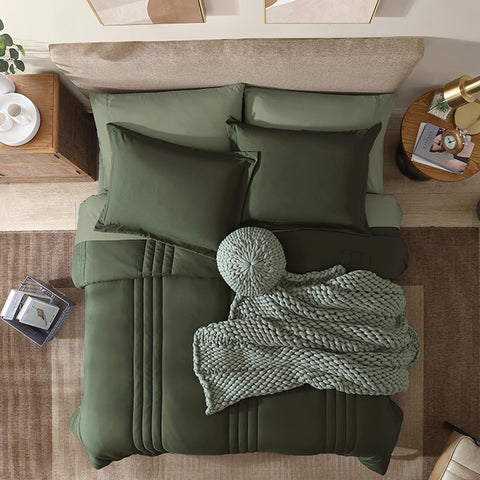 Monbix olive green comforter on bed shows plush warmth and neat styling
