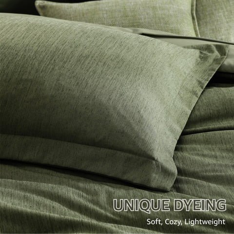 Monbix all-season comforter in olive green offers balanced warmth.