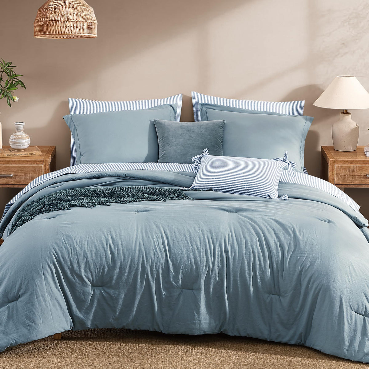 Monbix Queen comforter in dusty blue adds fluffy warmth for all-season sleep.