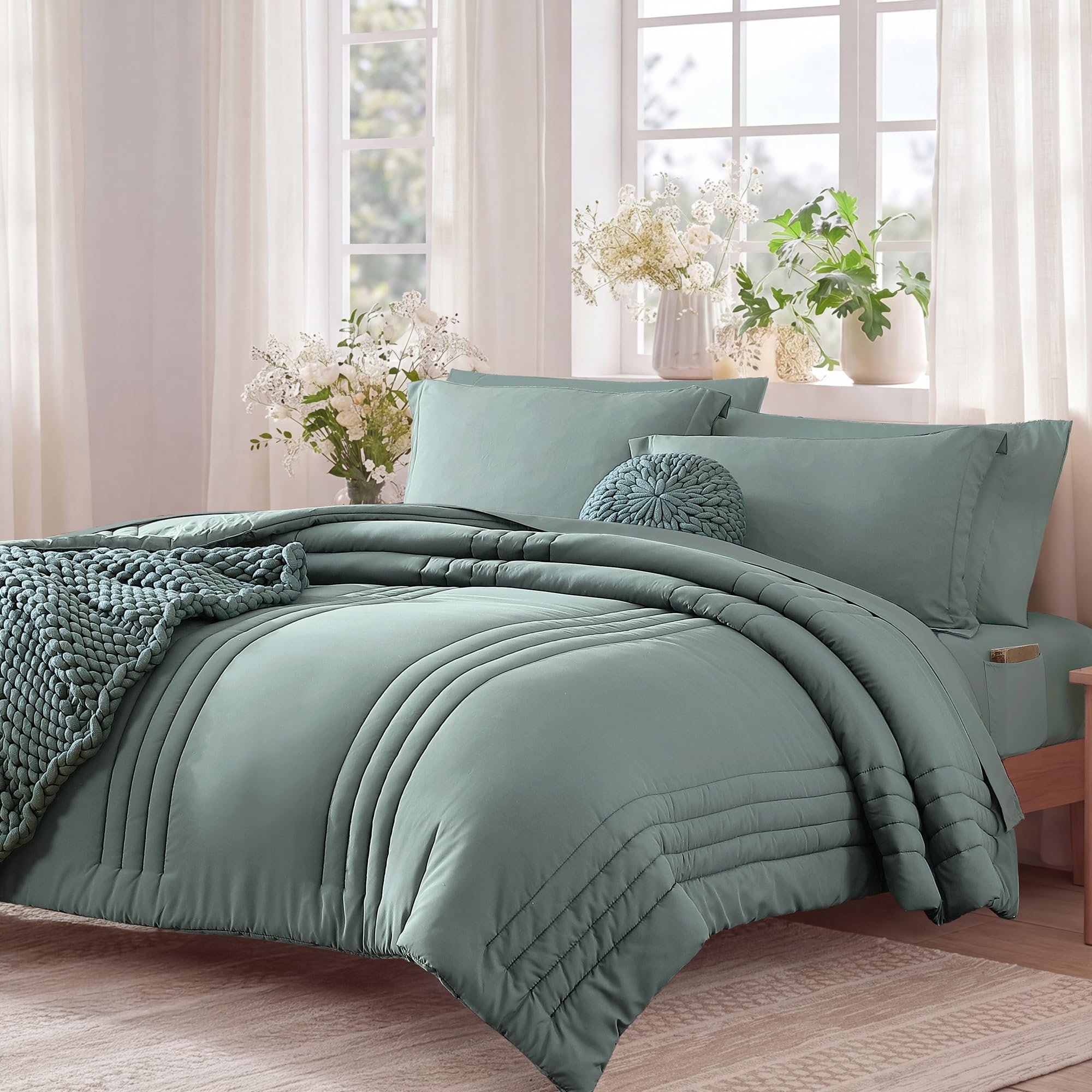 Close-up of soft sage green fabric from Monbix comforter set highlighting cloud-like warmth