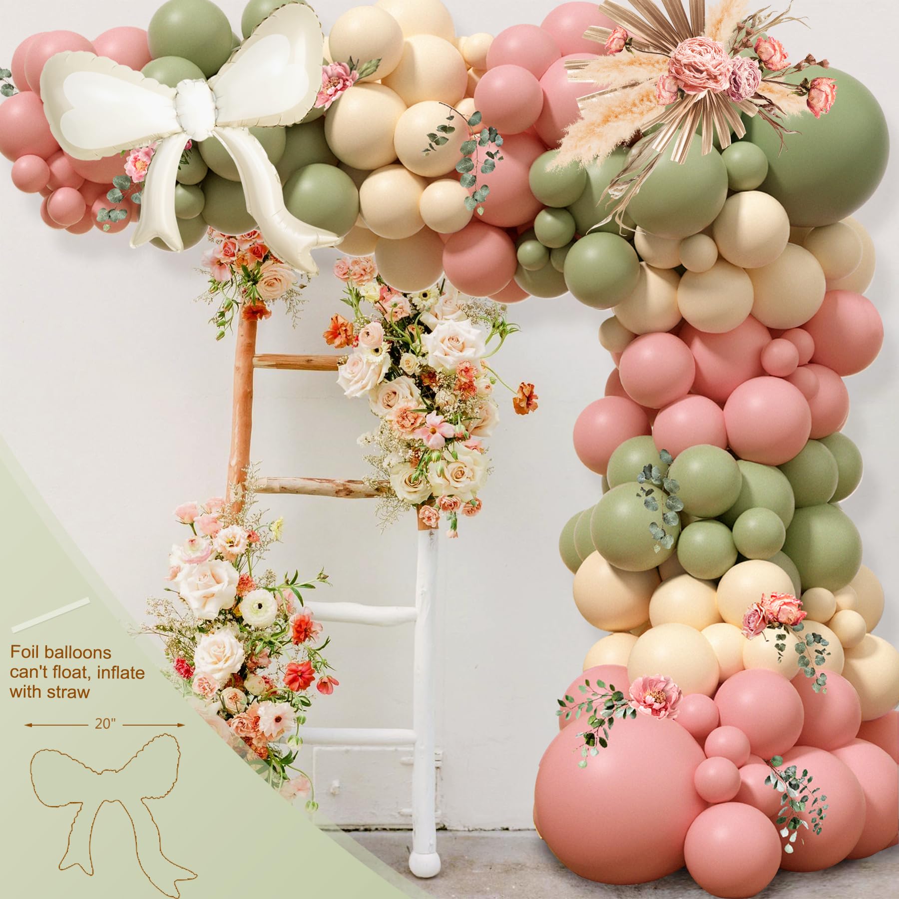 Monnberry bow foil balloon arch creates a dramatic focal point.