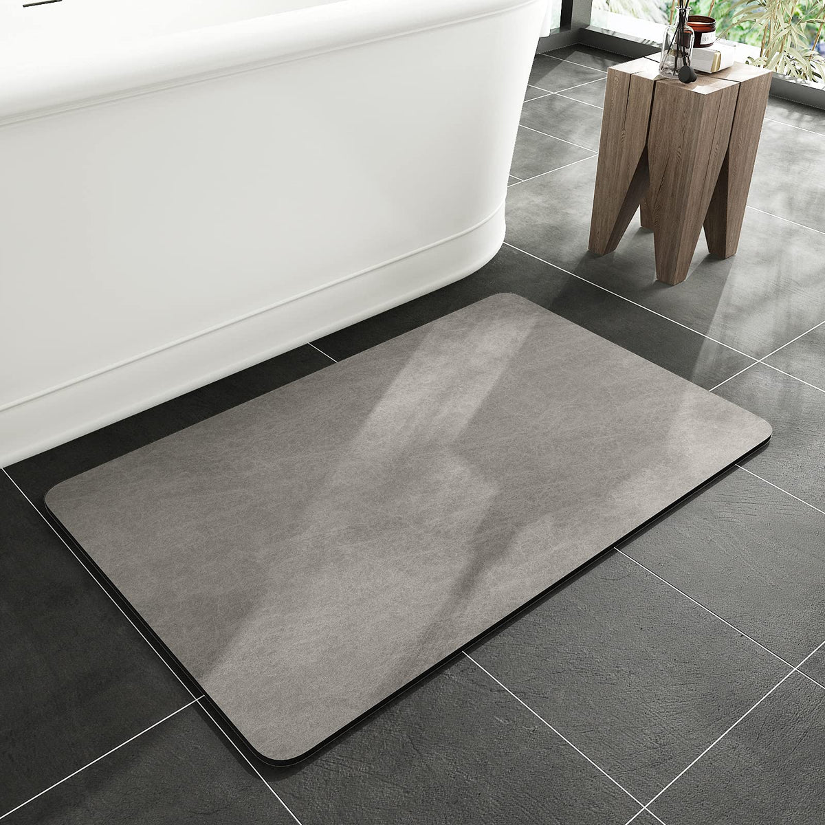 MontVoo bath mat with rubber backing offers anti-slip grip on wet bathroom floors.