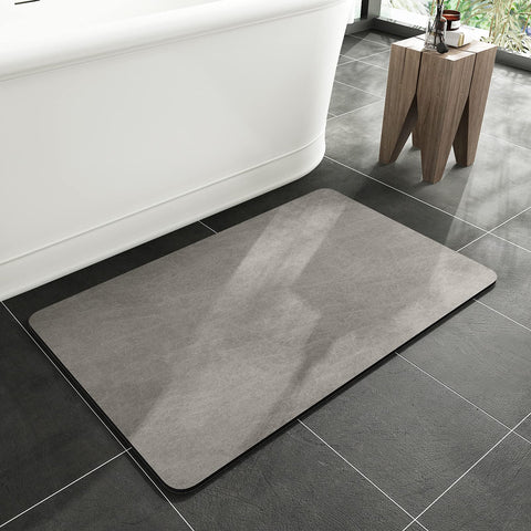 MontVoo bath mat with rubber backing offers anti-slip grip on wet bathroom floors.