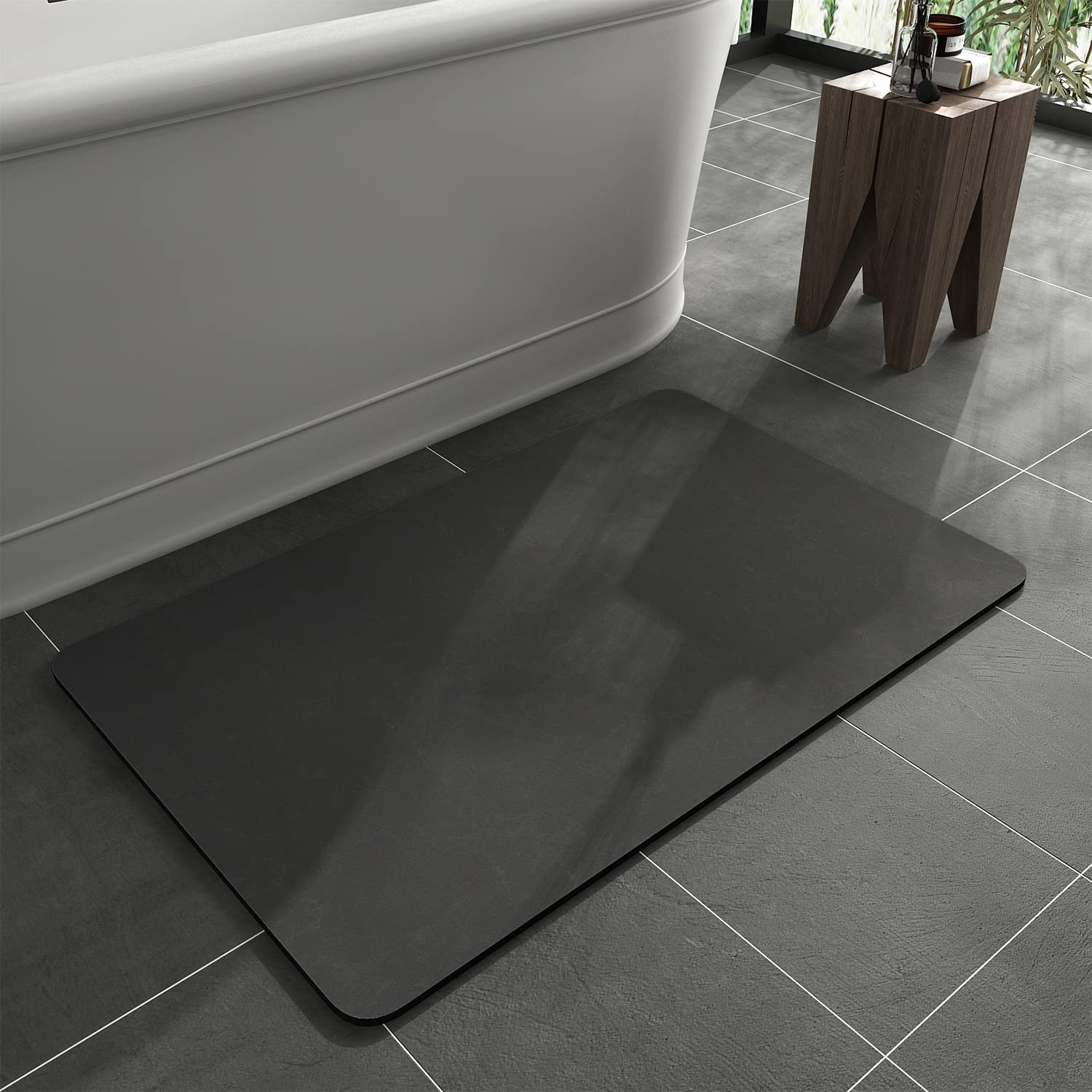 MontVoo bath mat with rubber backing provides secure non-slip grip on wet bathroom floors.
