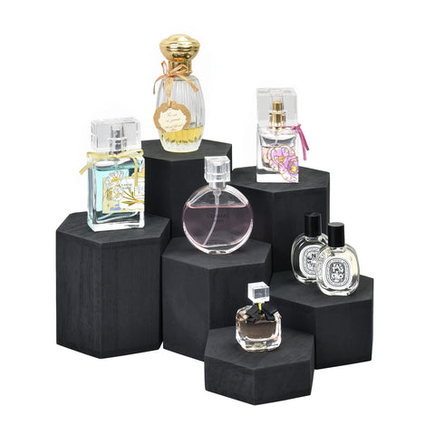 MOOCA jewelry display with watches and rings on hexagon risers