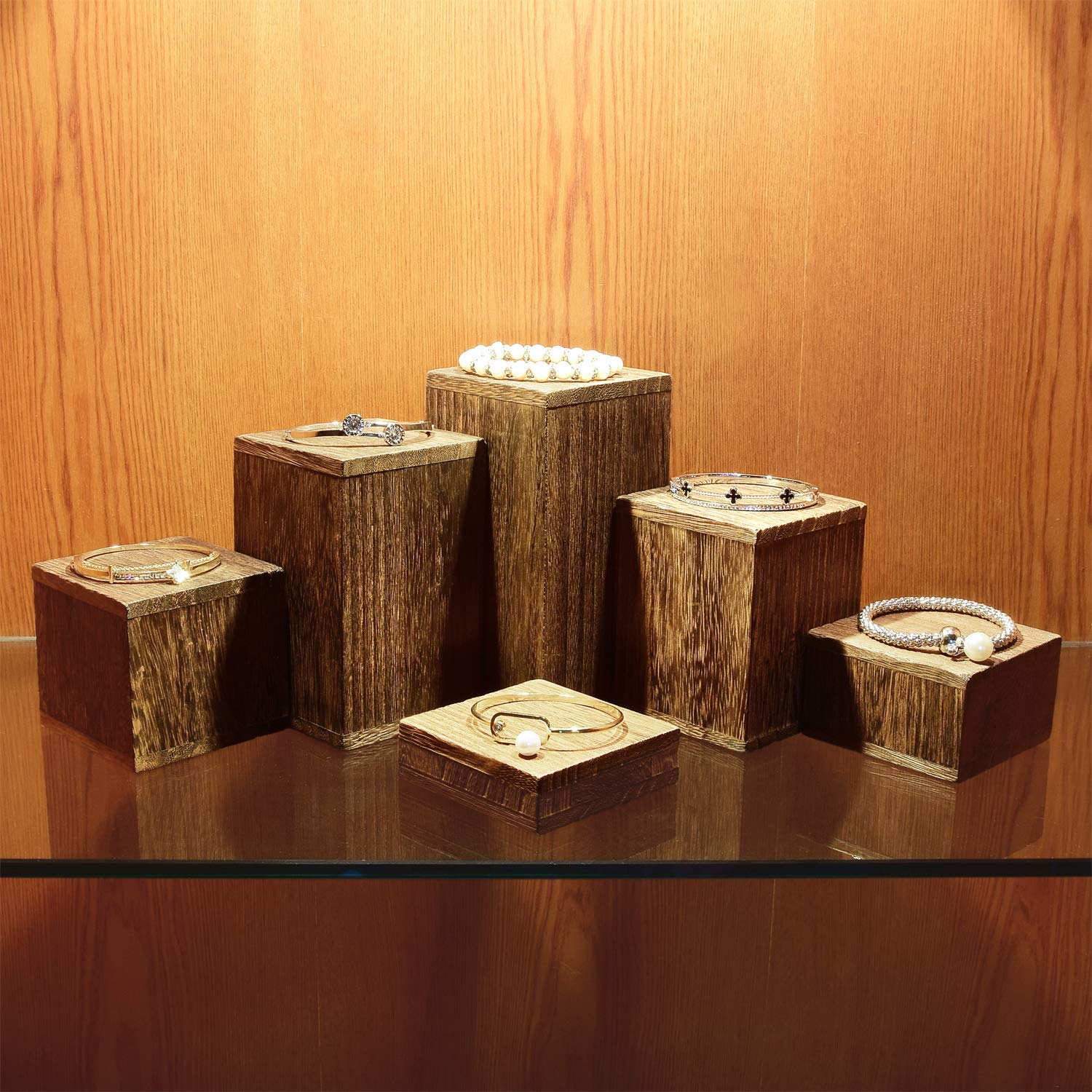 MOOCA wooden risers add height for cosmetics and small trinkets.