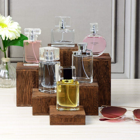 MOOCA wooden risers present eyewear clearly on a counter.