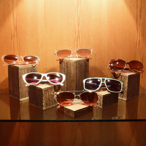 MOOCA wooden risers pair with figurines for dynamic displays.